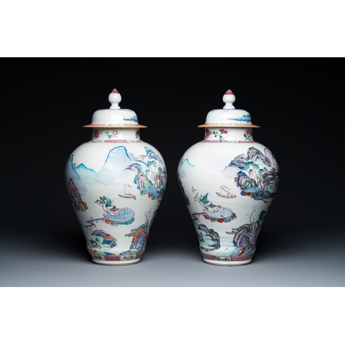 221 - A pair of Chinese famille rose vases and covers with mountainous river landscapes, YongzhengDescript... 