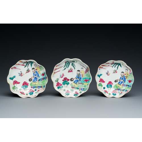 226 - Three Chinese relief-decorated famille rose 'lotus' cups and saucers with a scholar and his servant,... 