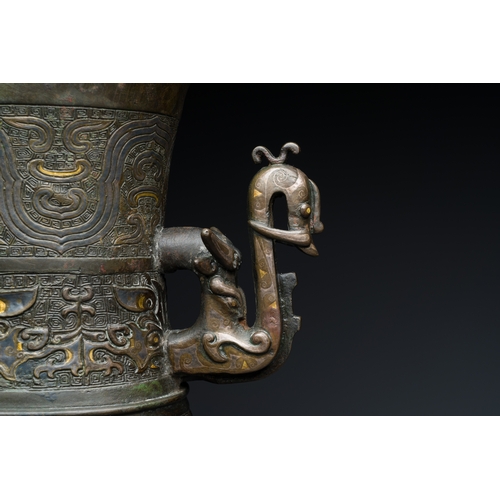 254 - An imposing Chinese archaistic gold-and-silver-inlaid bronze 'hu' vase on wooden stand inscribed Tao... 