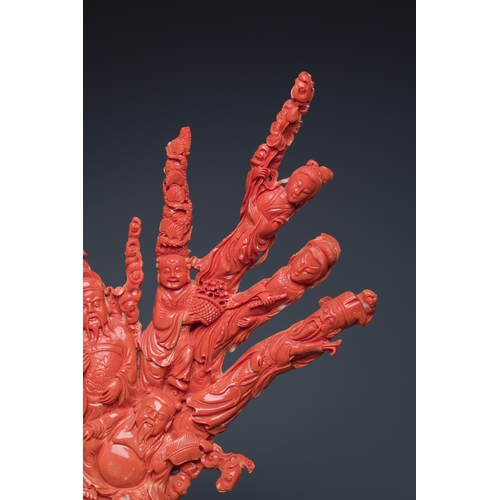 265 - A large Chinese red coral 'Baxian' group, 19/20th C.Description:H 45 - L 38 cm (incl. stand) Weight:... 