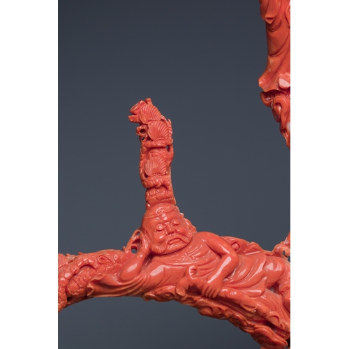 265 - A large Chinese red coral 'Baxian' group, 19/20th C.Description:H 45 - L 38 cm (incl. stand) Weight:... 