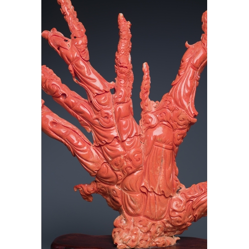 265 - A large Chinese red coral 'Baxian' group, 19/20th C.Description:H 45 - L 38 cm (incl. stand) Weight:... 