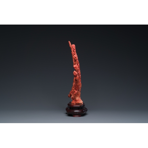 265 - A large Chinese red coral 'Baxian' group, 19/20th C.Description:H 45 - L 38 cm (incl. stand) Weight:... 