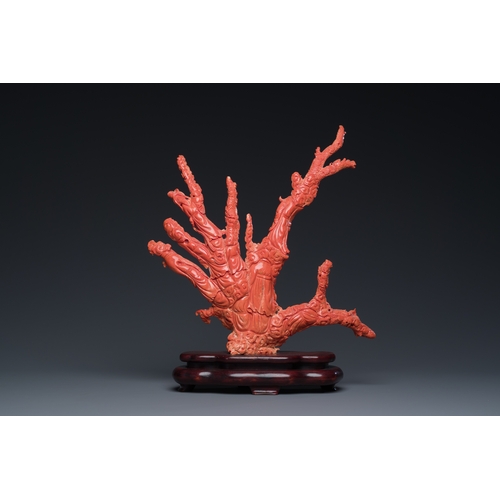 265 - A large Chinese red coral 'Baxian' group, 19/20th C.Description:H 45 - L 38 cm (incl. stand) Weight:... 