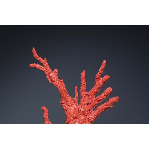 265 - A large Chinese red coral 'Baxian' group, 19/20th C.Description:H 45 - L 38 cm (incl. stand) Weight:... 