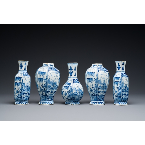 342 - A small blue and white Dutch Delft garniture of five vases, 18th C.Description:H.: 17,5 cm (the tall... 