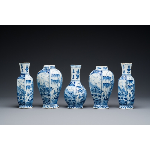 342 - A small blue and white Dutch Delft garniture of five vases, 18th C.Description:H.: 17,5 cm (the tall... 