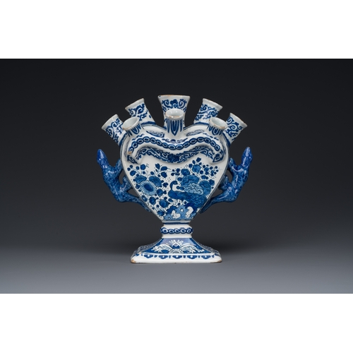 344 - A blue and white Dutch Delft tulip vase with peacocks in a garden, 17/18th C.Description:H.: 20 cm -... 