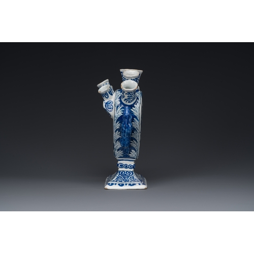 344 - A blue and white Dutch Delft tulip vase with peacocks in a garden, 17/18th C.Description:H.: 20 cm -... 