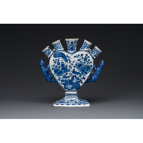 344 - A blue and white Dutch Delft tulip vase with peacocks in a garden, 17/18th C.Description:H.: 20 cm -... 