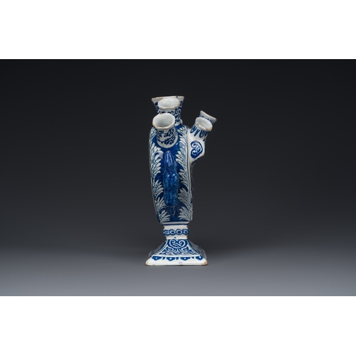 344 - A blue and white Dutch Delft tulip vase with peacocks in a garden, 17/18th C.Description:H.: 20 cm -... 