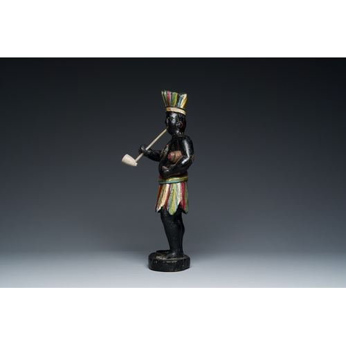 350 - An English polychromed wood sculpture of a pipe-smoking Indian from a tobacco store, 18th C.Descript... 