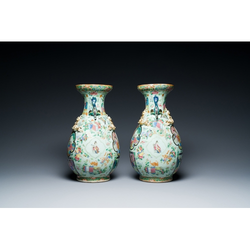 15 - A pair of Chinese Canton famille rose celadon-ground vases, 19th C.Description:H.: 37,5 cmCondition ... 