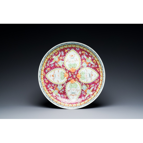 22 - A Chinese famille rose Bencharong dish for the Thai market, Kangxi mark, 19th C.Description:Dia.: 37... 