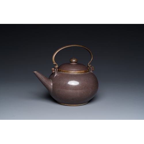 26 - A Chinese polished purple Yixing stoneware teapot and cover for the Thai market, Gong Ju è²¢å± mark... 