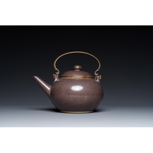 26 - A Chinese polished purple Yixing stoneware teapot and cover for the Thai market, Gong Ju è²¢å± mark... 