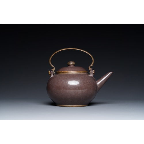 26 - A Chinese polished purple Yixing stoneware teapot and cover for the Thai market, Gong Ju è²¢å± mark... 