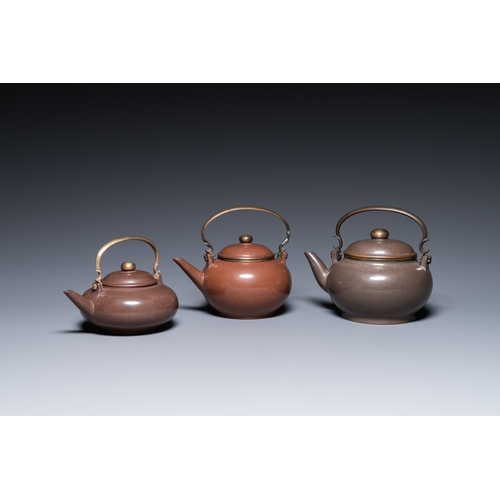 28 - Three Chinese polished Yixing stoneware teapots and covers for the Thai market, Gong Ju è´¡å± mark,... 