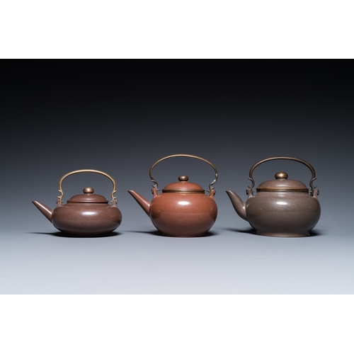 28 - Three Chinese polished Yixing stoneware teapots and covers for the Thai market, Gong Ju è´¡å± mark,... 