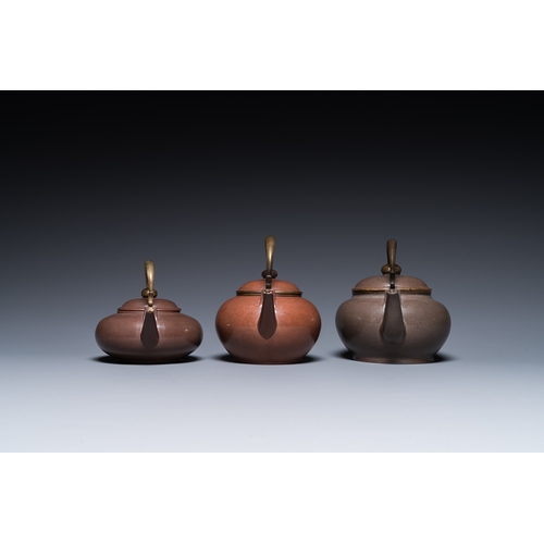 28 - Three Chinese polished Yixing stoneware teapots and covers for the Thai market, Gong Ju è´¡å± mark,... 