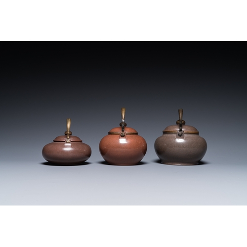 28 - Three Chinese polished Yixing stoneware teapots and covers for the Thai market, Gong Ju è´¡å± mark,... 