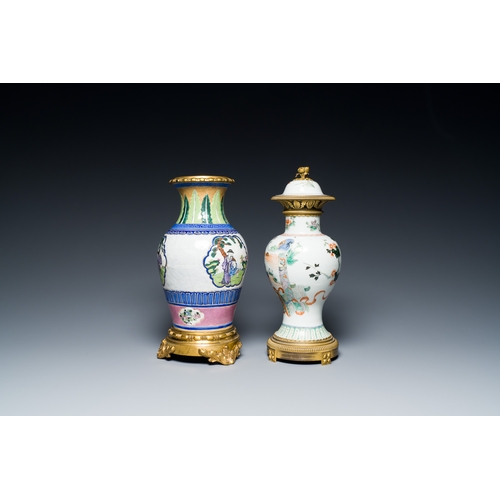 38 - A Chinese famille verte vase and an enamelled Yixing stoneware vase with gilt bronze mounts, 19th C.... 