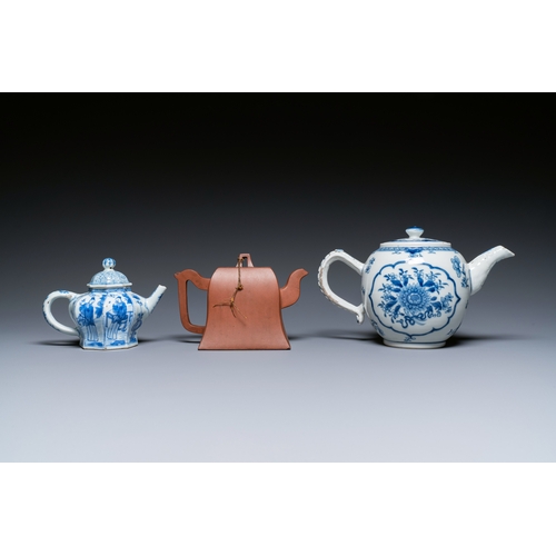 40 - Two Chinese blue and white teapots, one in Yixing stoneware and a powder-blue cup and saucer, Kangxi... 