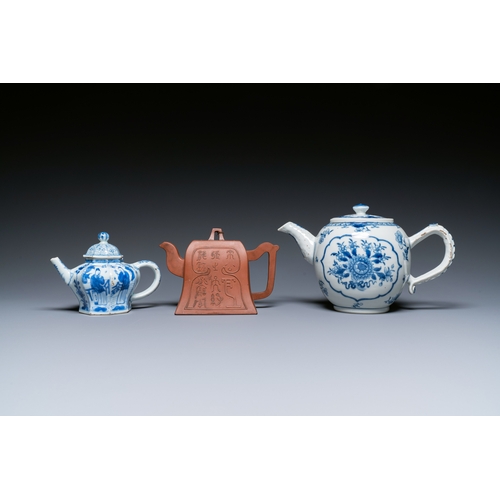 40 - Two Chinese blue and white teapots, one in Yixing stoneware and a powder-blue cup and saucer, Kangxi... 