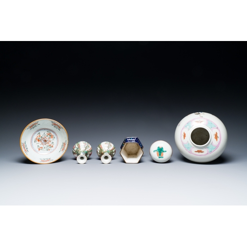 53 - A varied collection of Chinese porcelain and Canton enamel, 18/19th C.Description:H.: 35 cm (the tal... 