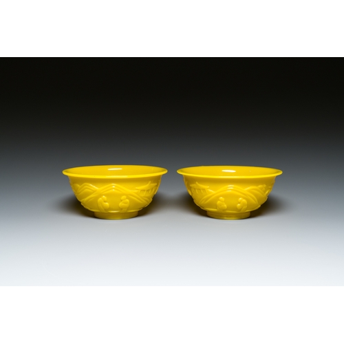 58 - A pair of Chinese yellow Beijing glass bowls with figures in a landscape, CHINA mark, RepublicDescri... 