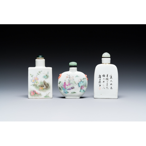 69 - Three Chinese famille rose snuff bottles, one marked Yongzheng, 19th C.Description:H.: 9 cm (the tal... 