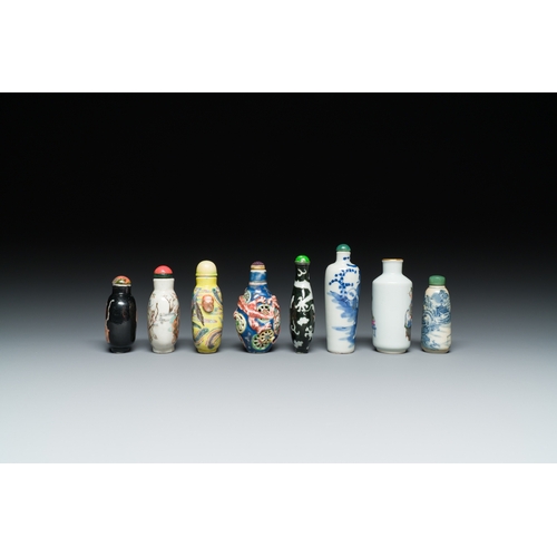 77 - Eight Chinese blue and white, famille noire and famille rose snuff bottles, various marks, 19th C.De... 