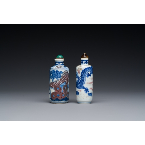 81 - Two Chinese blue, white and copper-red snuff bottles, 19th C.Description:H.: 9 cm (the tallest bottl... 