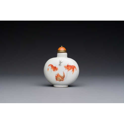 82 - A Chinese iron-red and grisaille 'goldfish' snuff bottle, Daoguang mark and of the periodDescription... 