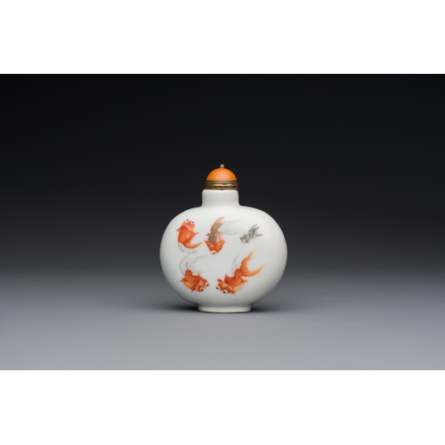 82 - A Chinese iron-red and grisaille 'goldfish' snuff bottle, Daoguang mark and of the periodDescription... 