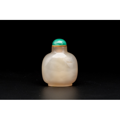 85 - A Chinese agate 'two horses' snuff bottle, 19th C.Description:H.: 7 cmCondition reports:Please conta... 