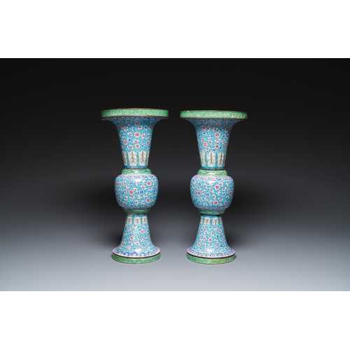 96 - A pair of Chinese Canton enamel 'gu' vases with floral design, QianlongDescription:H.: 46,5 cmCondit... 