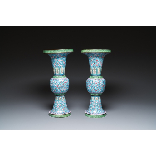 96 - A pair of Chinese Canton enamel 'gu' vases with floral design, QianlongDescription:H.: 46,5 cmCondit... 