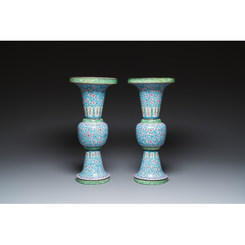 96 - A pair of Chinese Canton enamel 'gu' vases with floral design, QianlongDescription:H.: 46,5 cmCondit... 