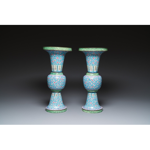 96 - A pair of Chinese Canton enamel 'gu' vases with floral design, QianlongDescription:H.: 46,5 cmCondit... 