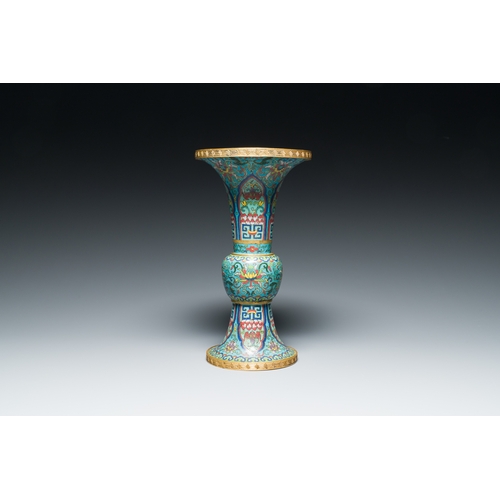 113 - A Chinese cloisonne 'gu' vase with lotus scrolls, 18/19th C.Description:H.: 32 cmCondition reports:P... 