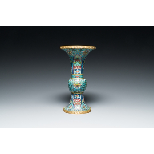 113 - A Chinese cloisonne 'gu' vase with lotus scrolls, 18/19th C.Description:H.: 32 cmCondition reports:P... 