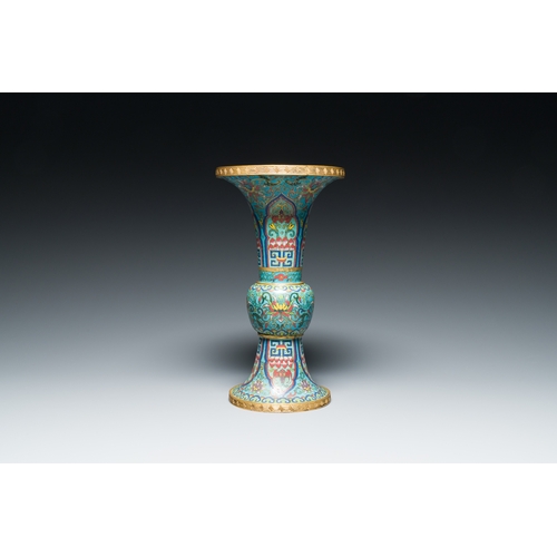 113 - A Chinese cloisonne 'gu' vase with lotus scrolls, 18/19th C.Description:H.: 32 cmCondition reports:P... 