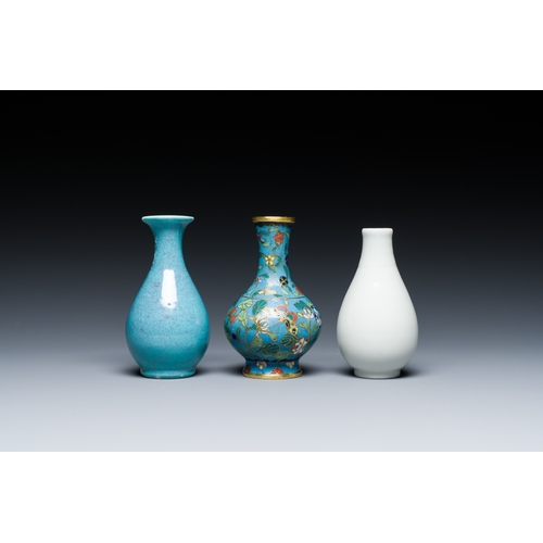 118 - Three small Chinese bottle vases in cloisonne, white and robin's-egg-glazed porcelain, 19/20th C.Des... 