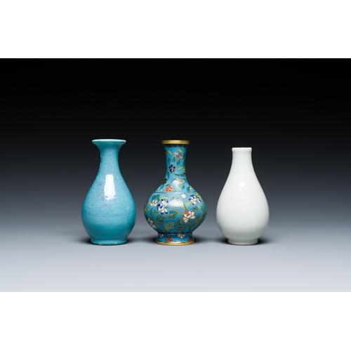 118 - Three small Chinese bottle vases in cloisonne, white and robin's-egg-glazed porcelain, 19/20th C.Des... 