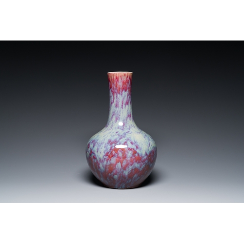 119 - A Chinese flambe-glazed bottle vase, 19th C.Description:H.: 39 cm (the vase)H.: 42 cm (incl. the sta... 