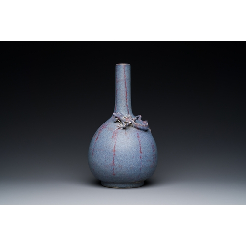 141 - A Chinese flambe-glazed bottle vase, 18/19th C.Description:H.: 32 cmCondition reports:Please contact... 