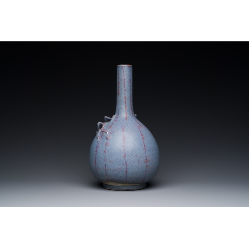 141 - A Chinese flambe-glazed bottle vase, 18/19th C.Description:H.: 32 cmCondition reports:Please contact... 