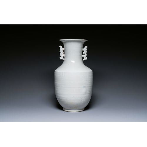 146 - A Chinese white-glazed vase on wooden stand, 19th C.Description:H.: 51,5 cm (the vase)H.: 70,5 cm (i... 