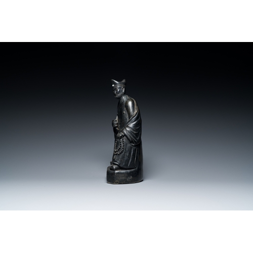 155 - A Chinese monochrome black-glazed figure of Ji Gong, 18th C.Description:H.: 30 cmCondition reports:P... 